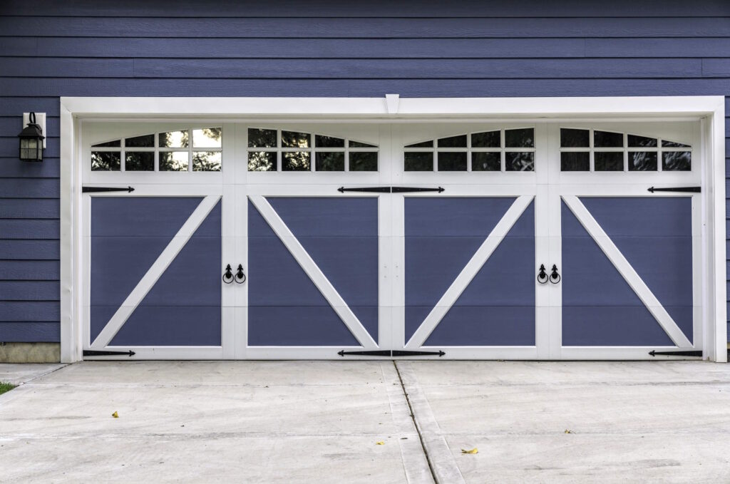 Blue and white carriage style garage door