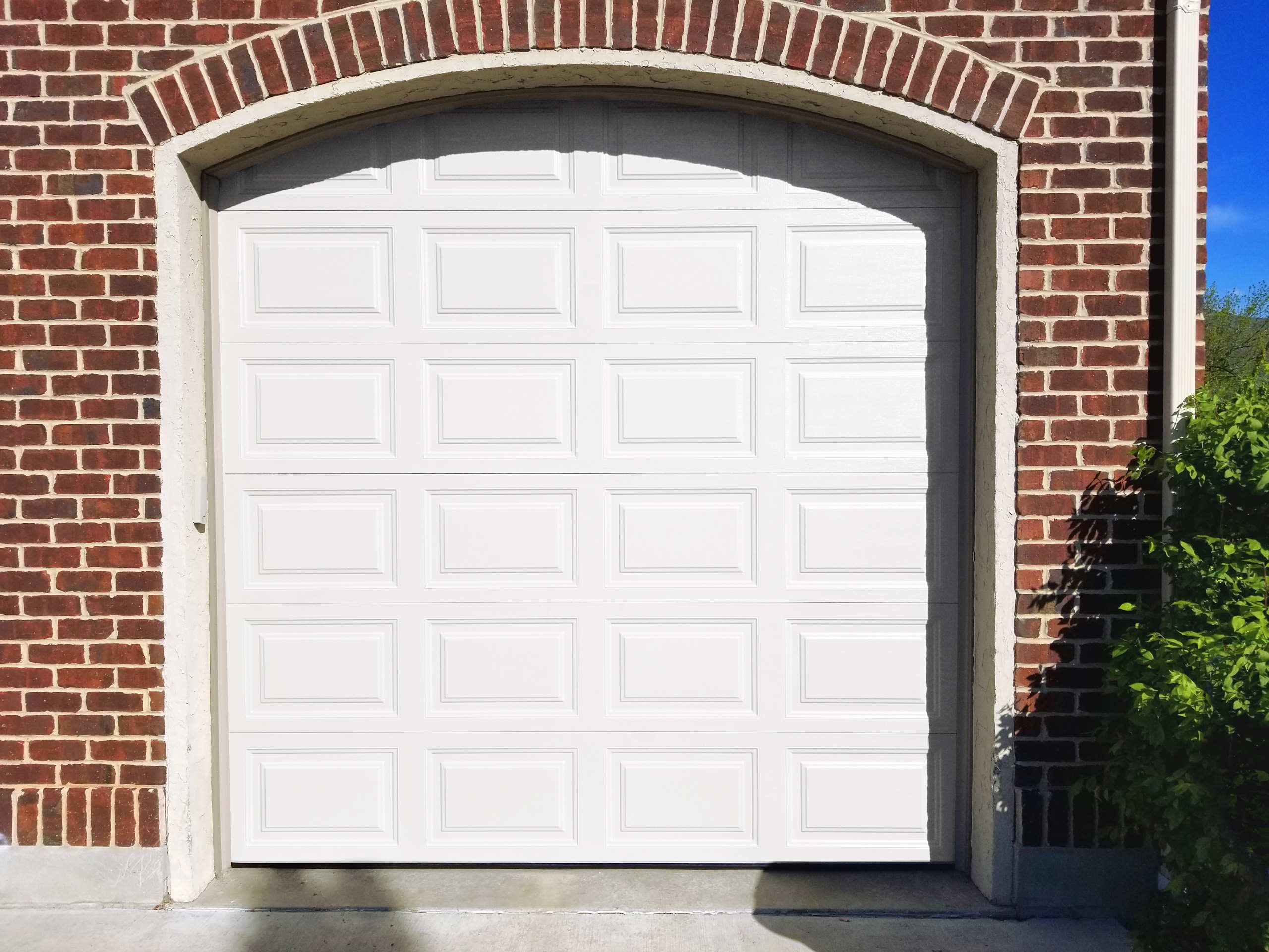 White raised panel garage door